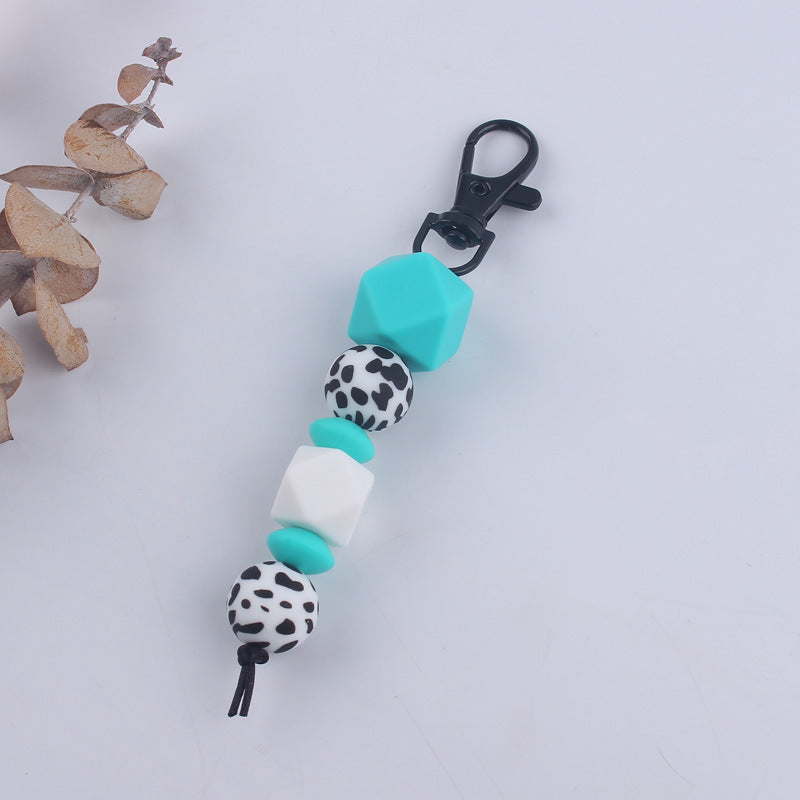 Llavero con cuentas de leopardo de silicona al por mayor